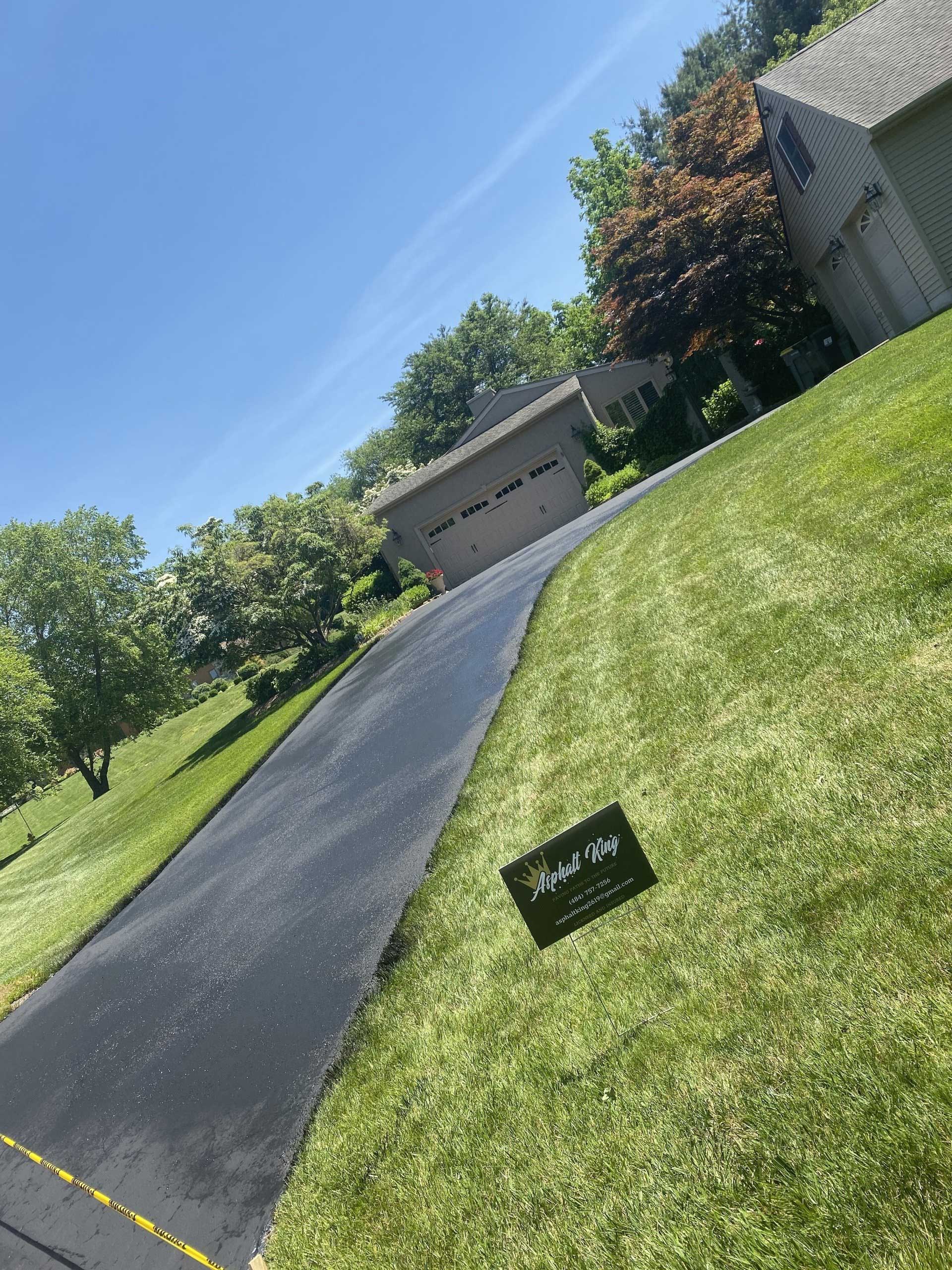 Garage Asphalt Driveway — Wilmington, DE — Asphalt King Sealcoating & Paving LLC