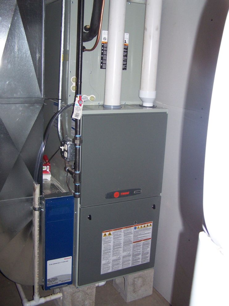 technician working on AC unit