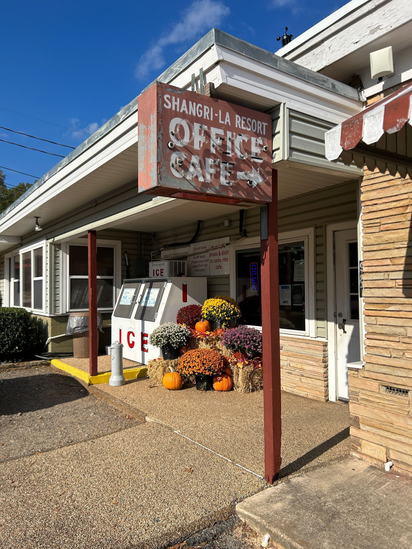 A building with a sign that says `` office cafe '' on it.