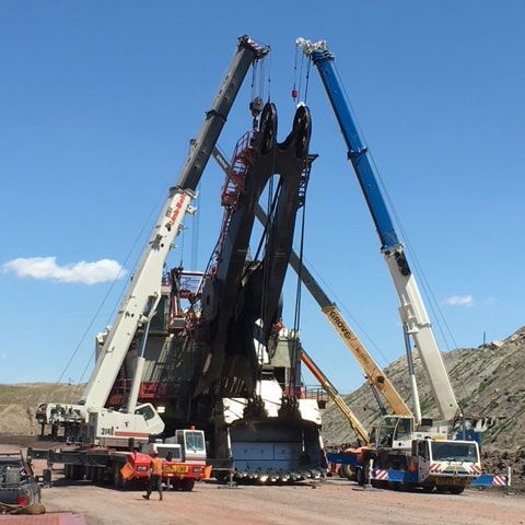 Carrying a Huge Excavator — Gillette, WY — Black Hawk Crane & Rigging Inc