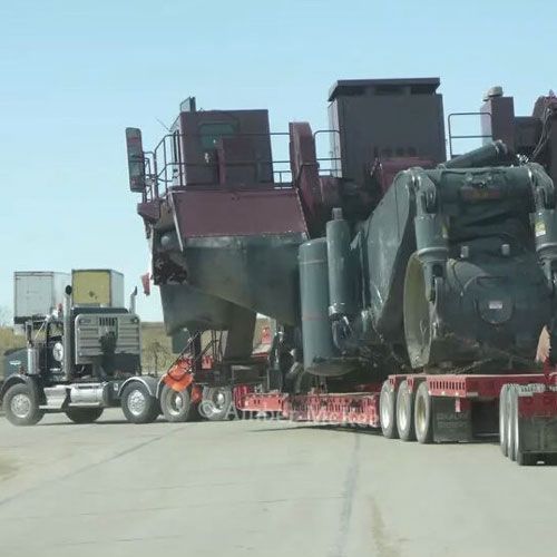 Truck Carrying a Heavy Load — Gillette, WY — Black Hawk Crane & Rigging Inc