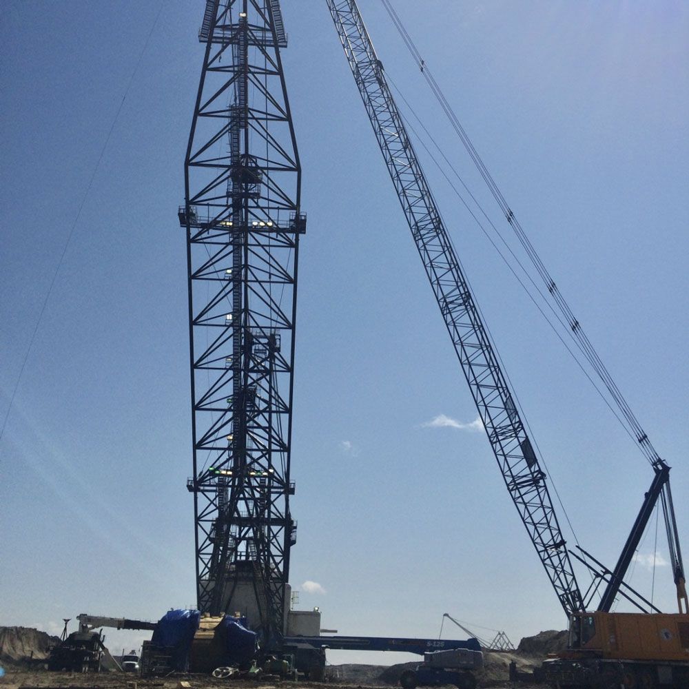 Crane and A Transmission Tower — Gillette, WY — Black Hawk Crane & Rigging Inc