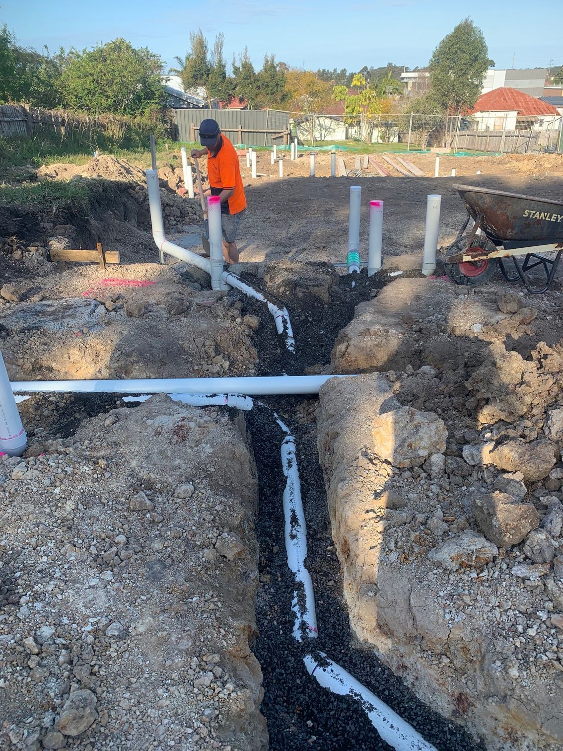 Man Working To Build Drain Pipe — BAS Plumbing & Drainage In Forresters Beach, NSW