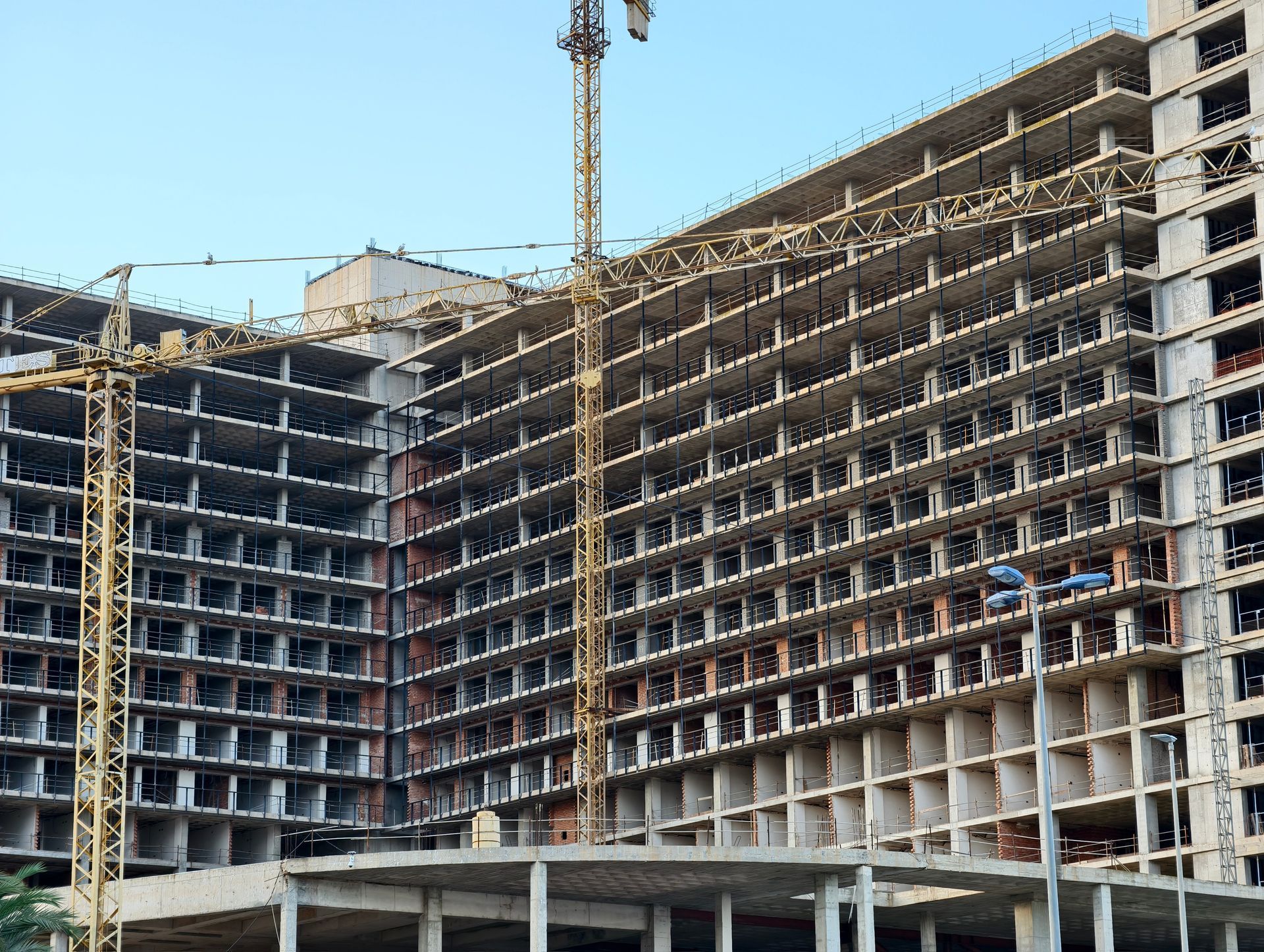 An active building construction with safety emphasis and structural details.