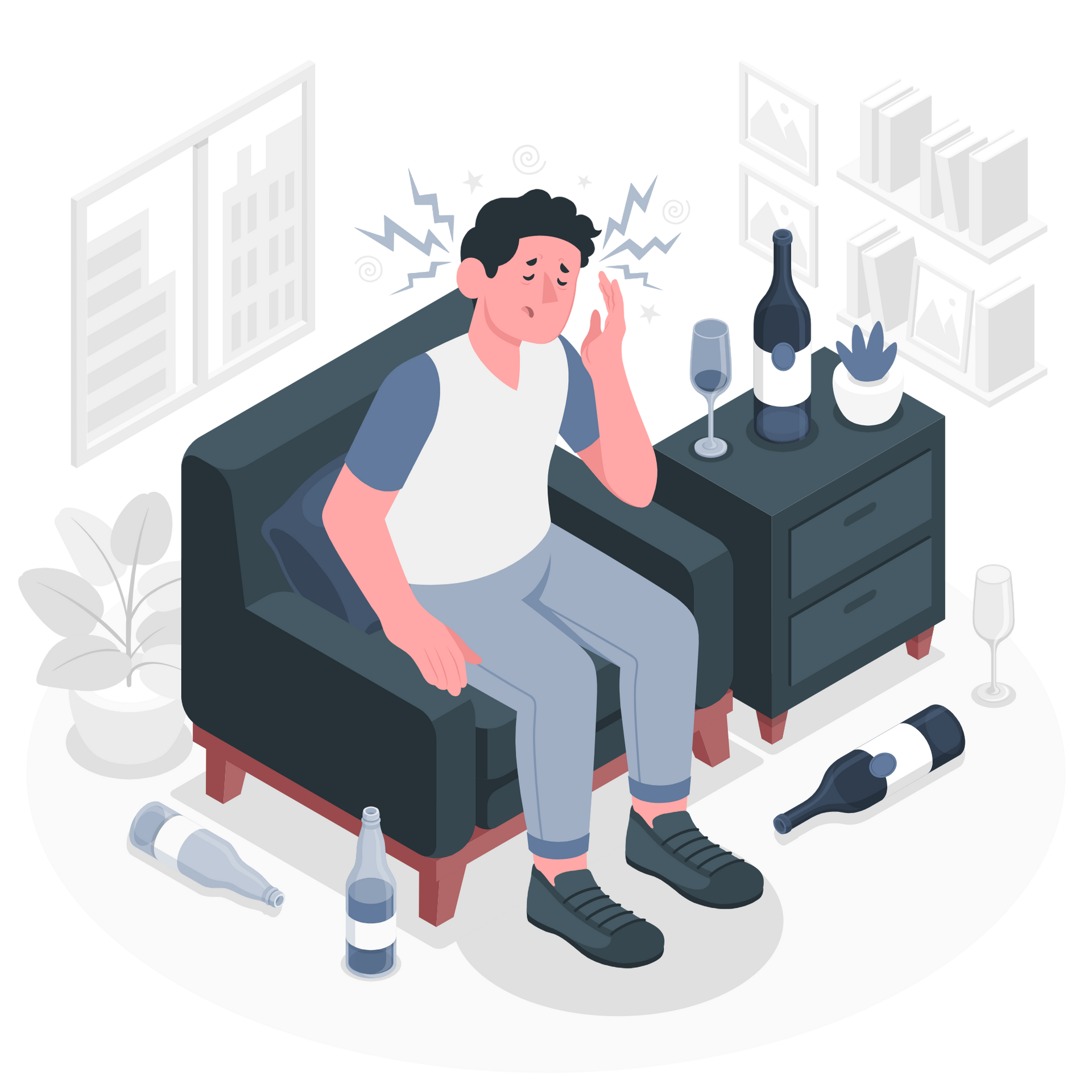 A man is sitting on a couch with a headache.