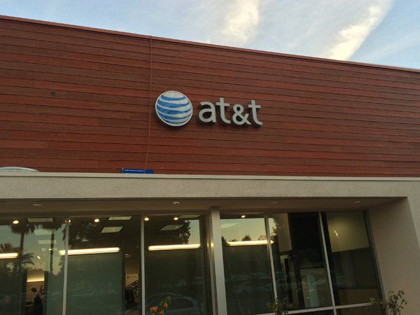 A building with a sign that says at & t on it