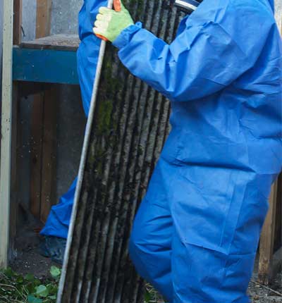 Asbestos — Grey Asbestos Being Removed From A Residental Property in Corpus Christi, TX