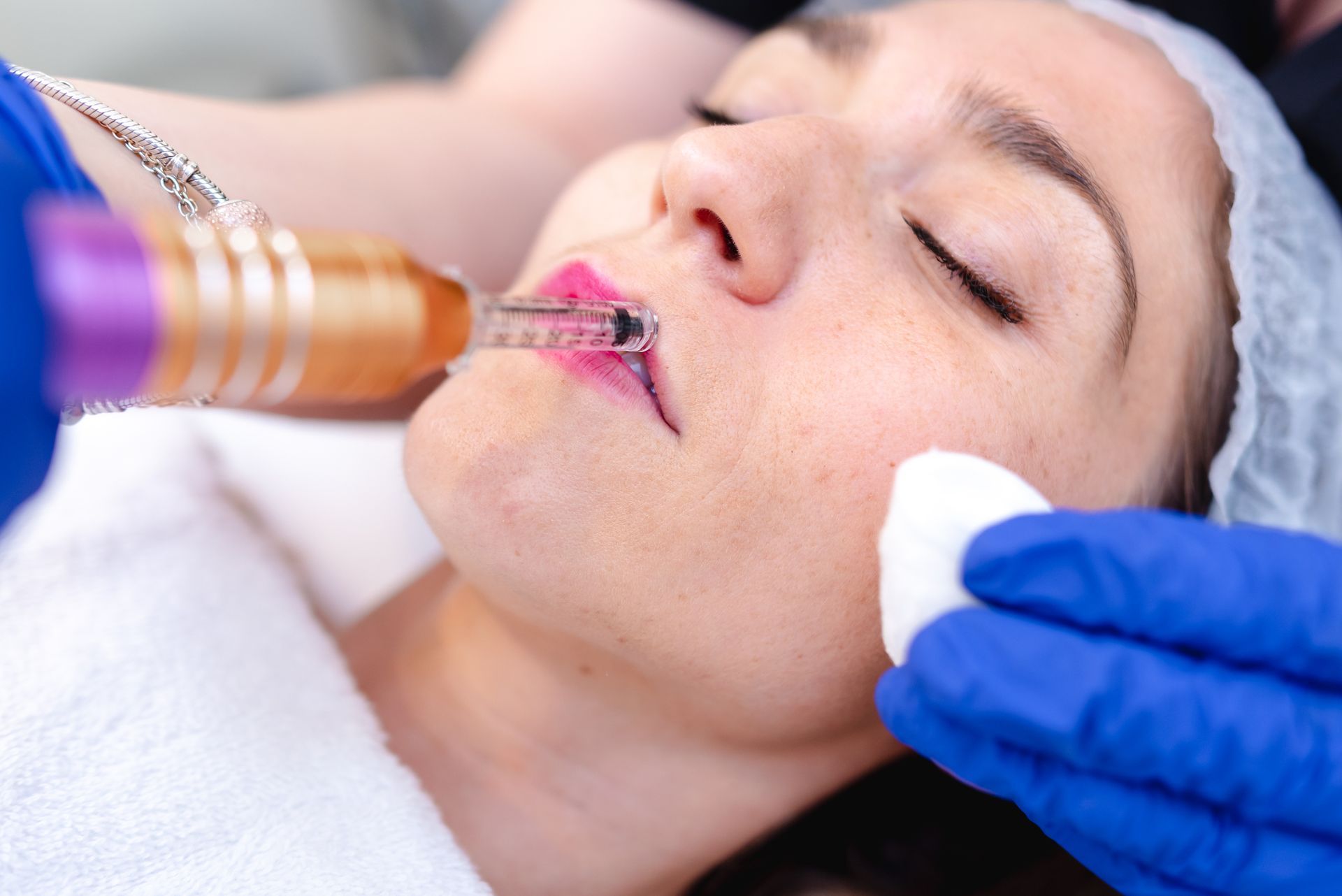 A woman is getting Botox injected.
