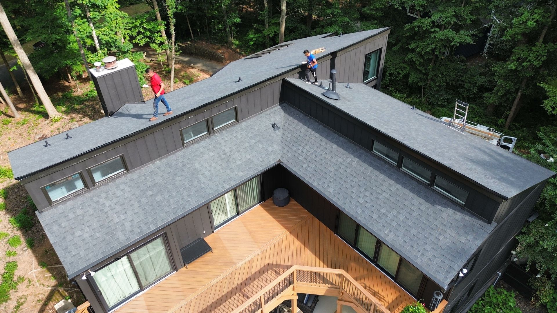 Aerial view of completed asphalt roof replacement