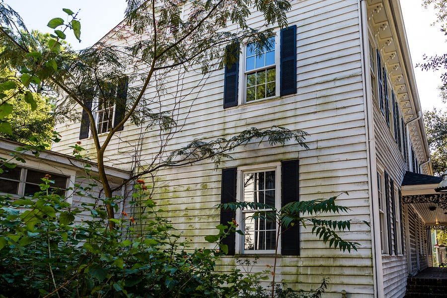 Damaged siding on Georgia home needing replacement