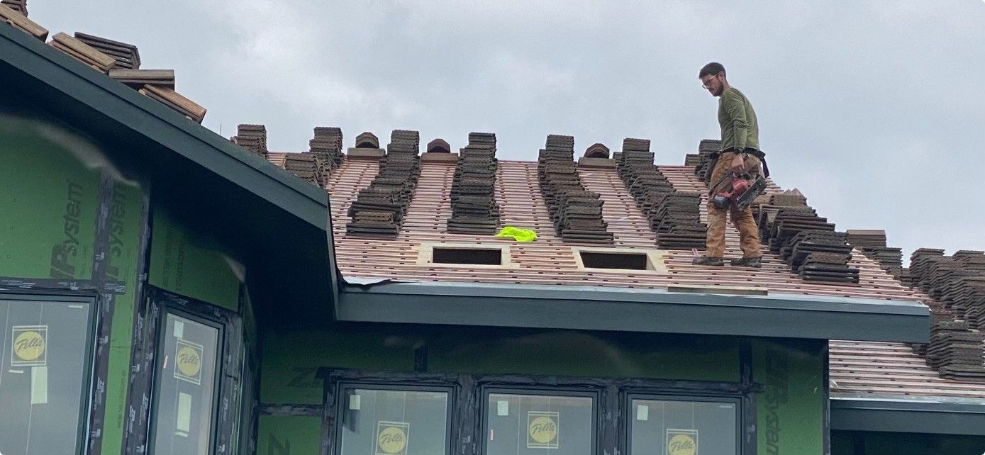 roofing tiles being installed
