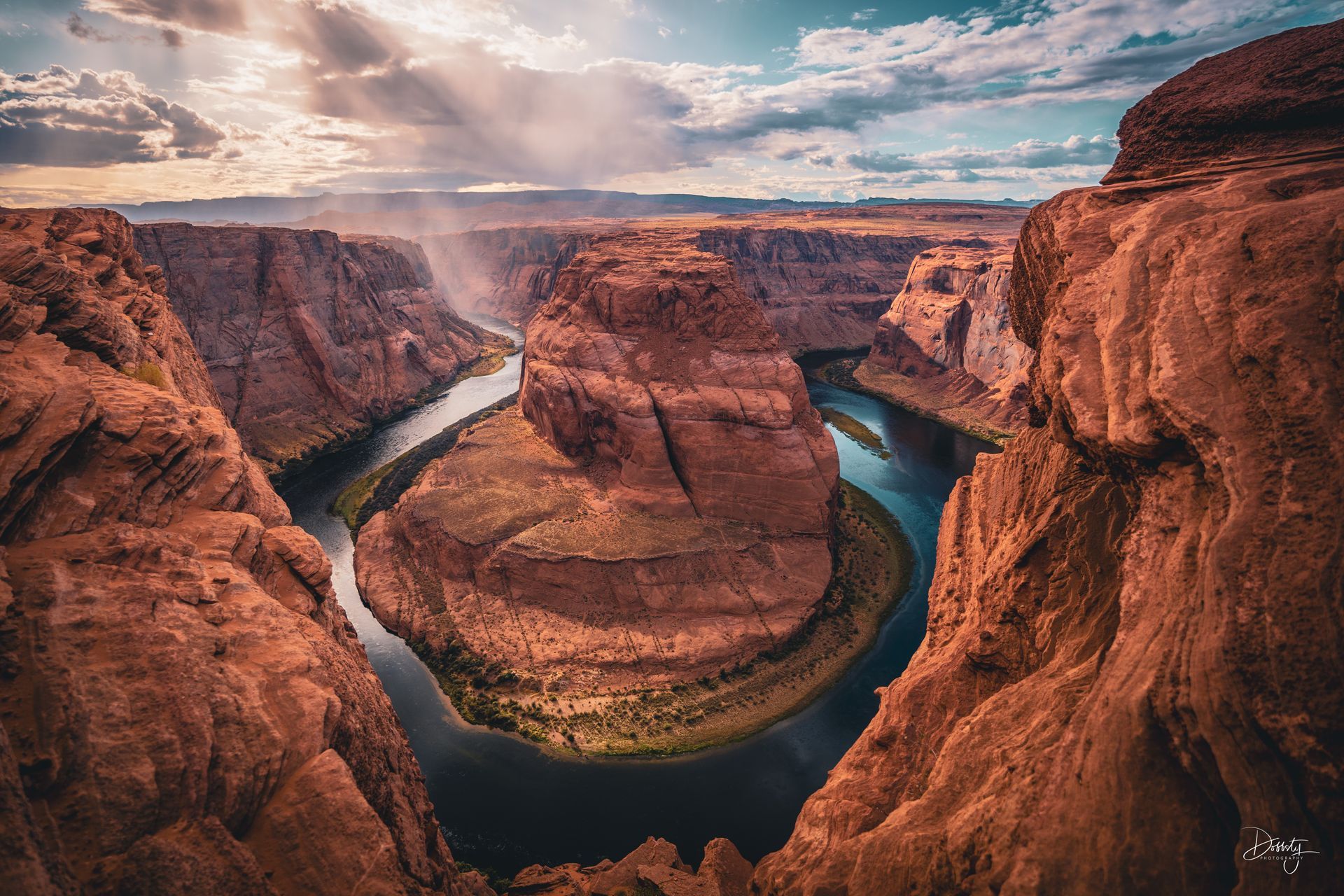 Stunning sunset rain storm in Horseshoe Bend south of Page, AZ