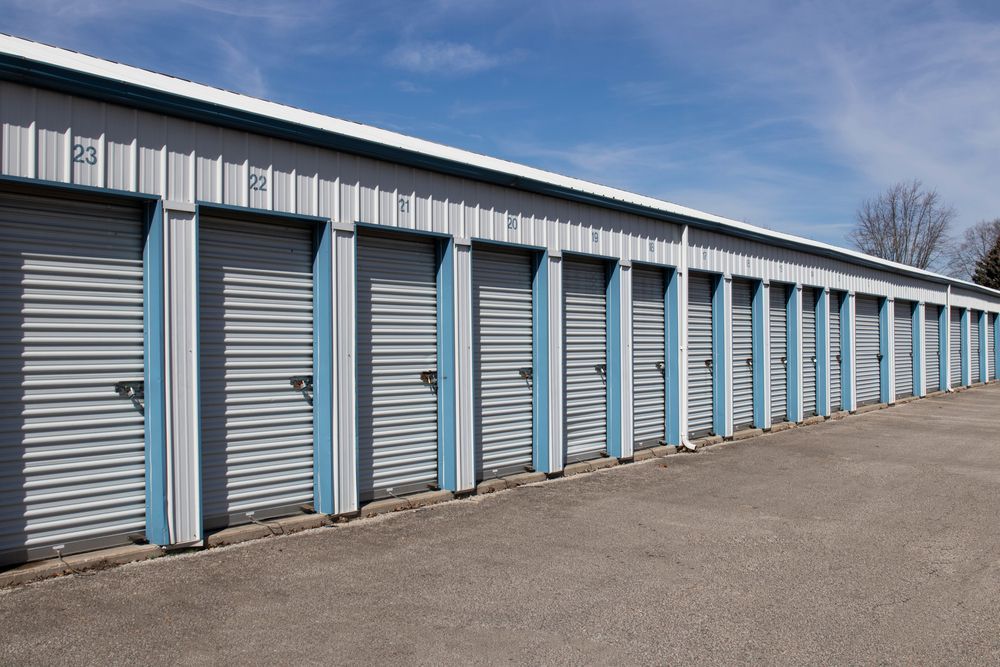 Row of Gray and Light Blue Storage Units Under a Blue Sky — Gympie Southside Mini Storage in Southside, QLD