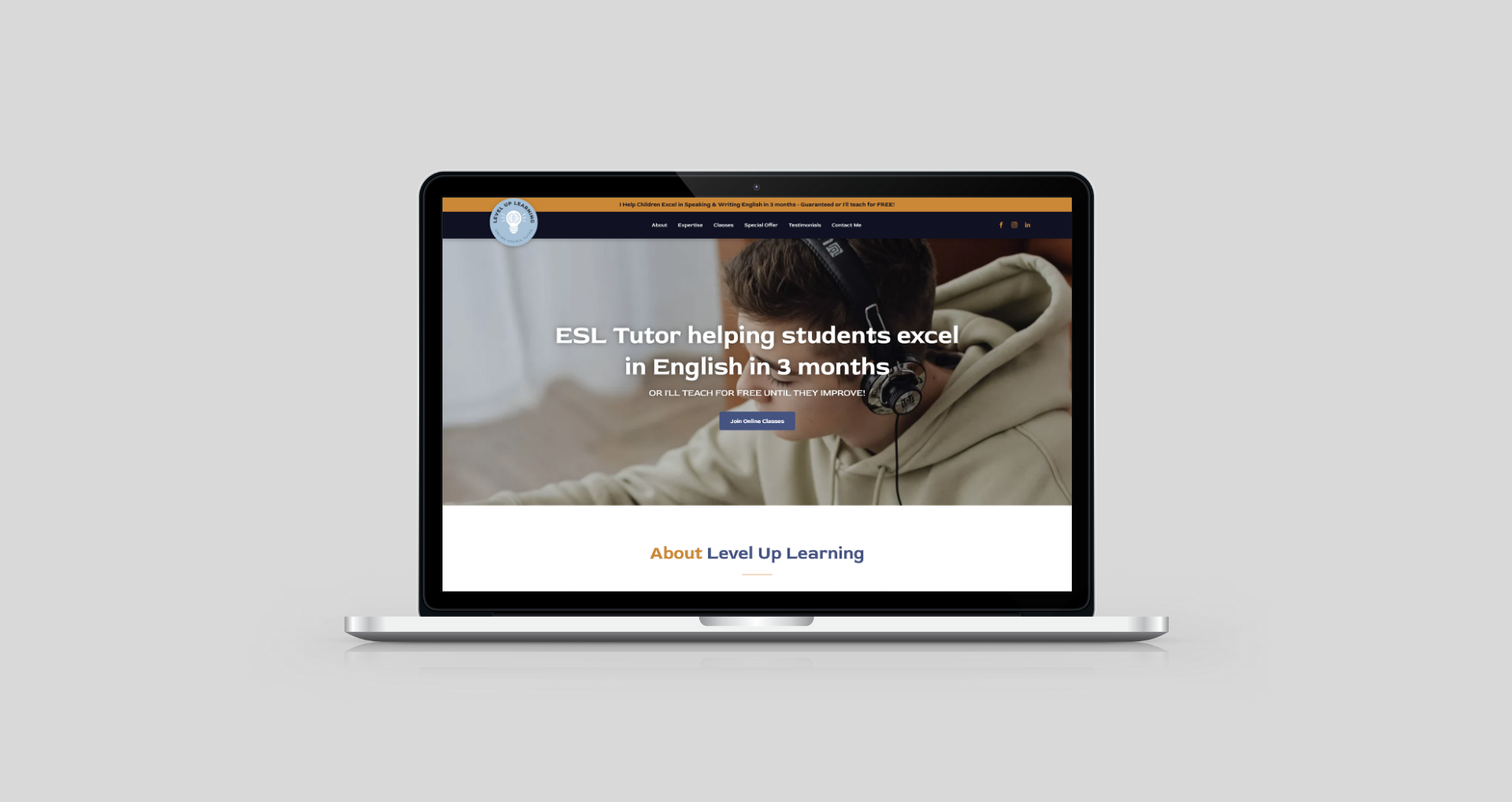 Laptop displaying a website with pastel illustrations of stationery items like a mug and notebook.