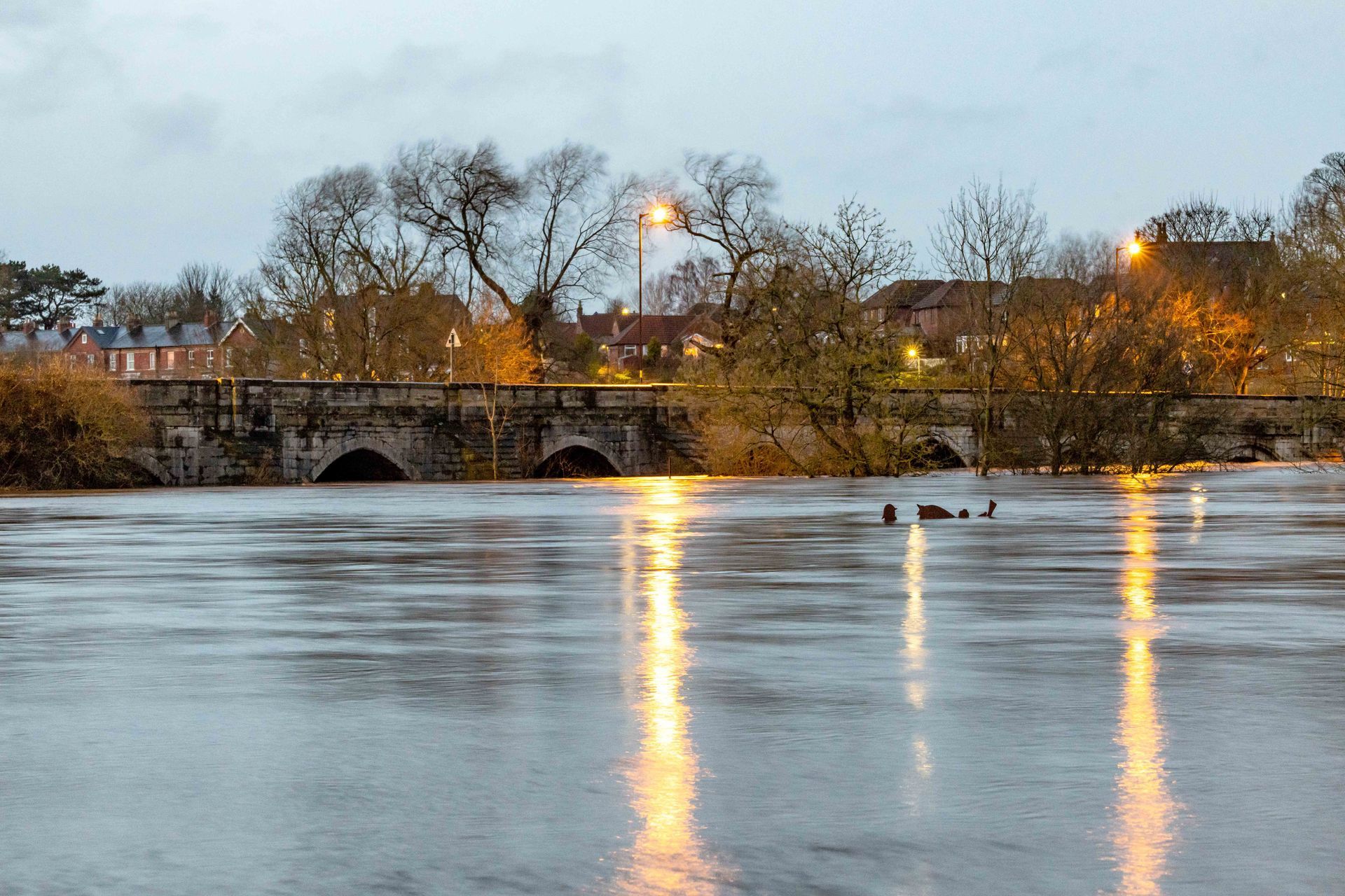 River Ure in flood by North Bridge, Ripon, North Yorkshire