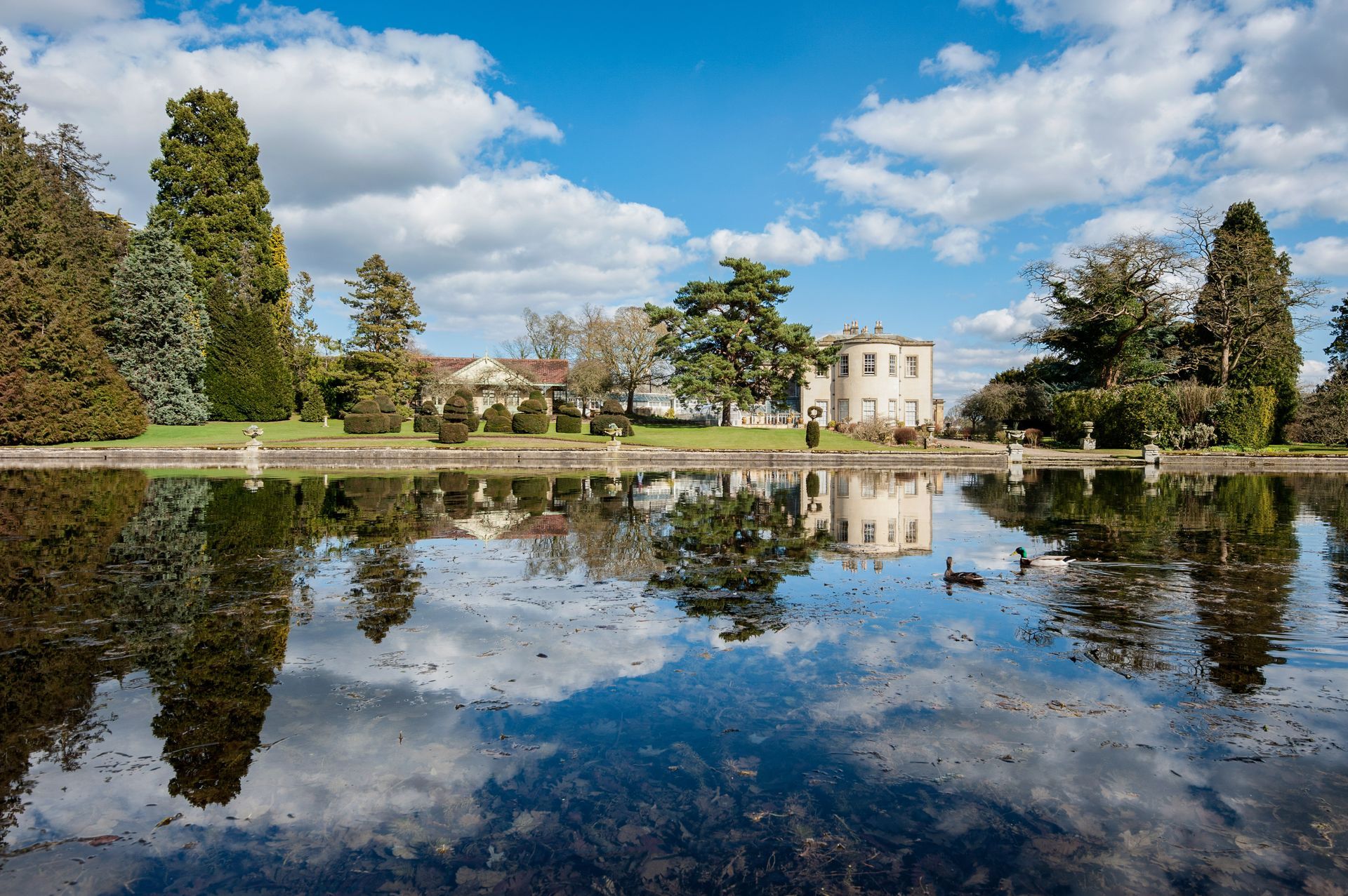 Thorp Perrow Hall reflected in lake