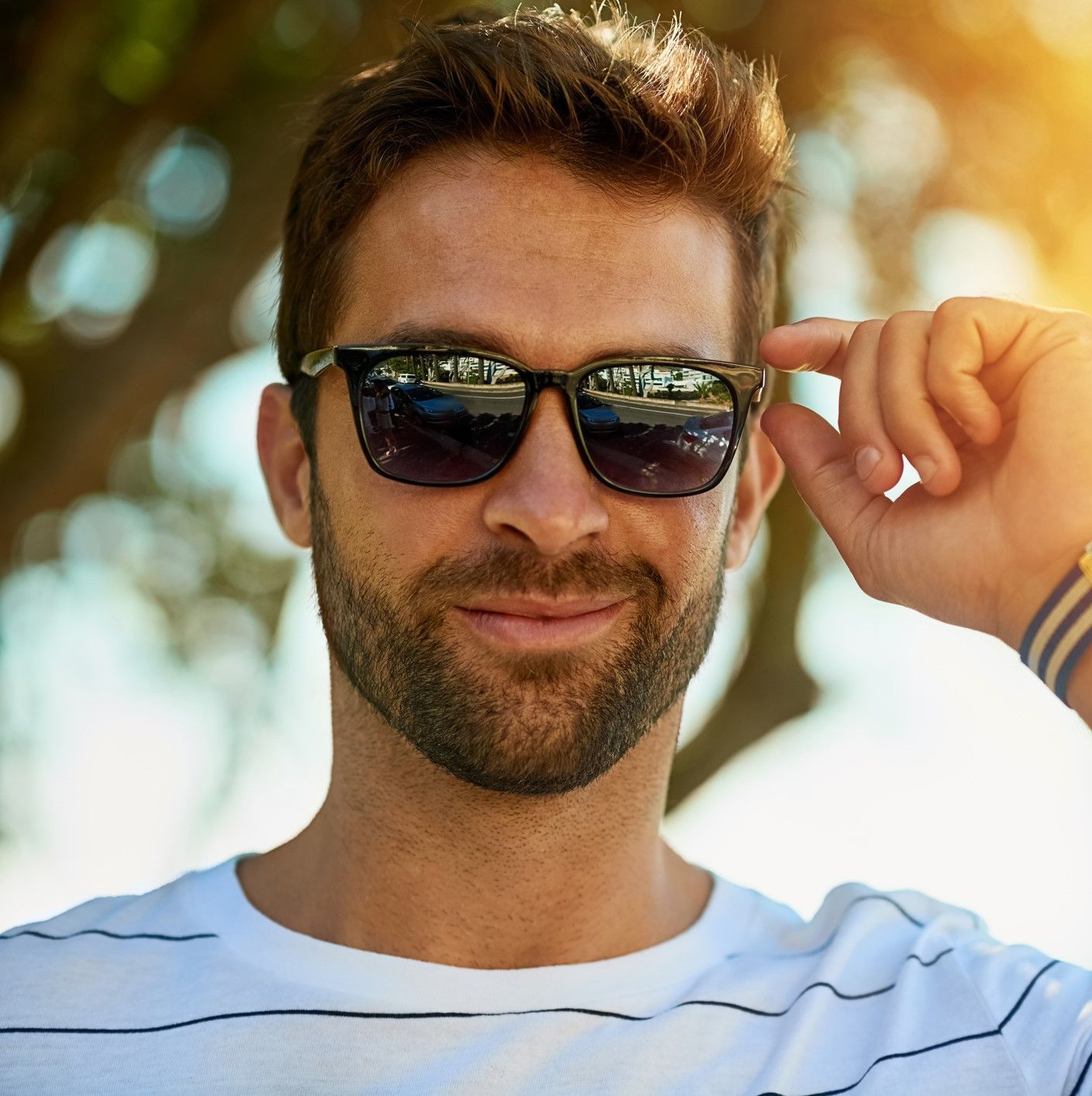 A Man With a Beard Wearing Sunglasses – Largo, FL - Optical Factory and Showroom