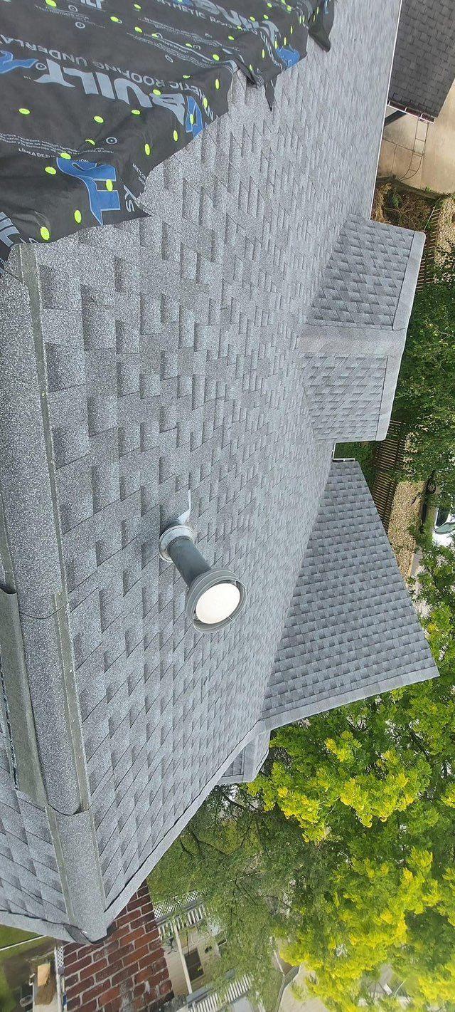 An aerial view of a roof with a light on it.