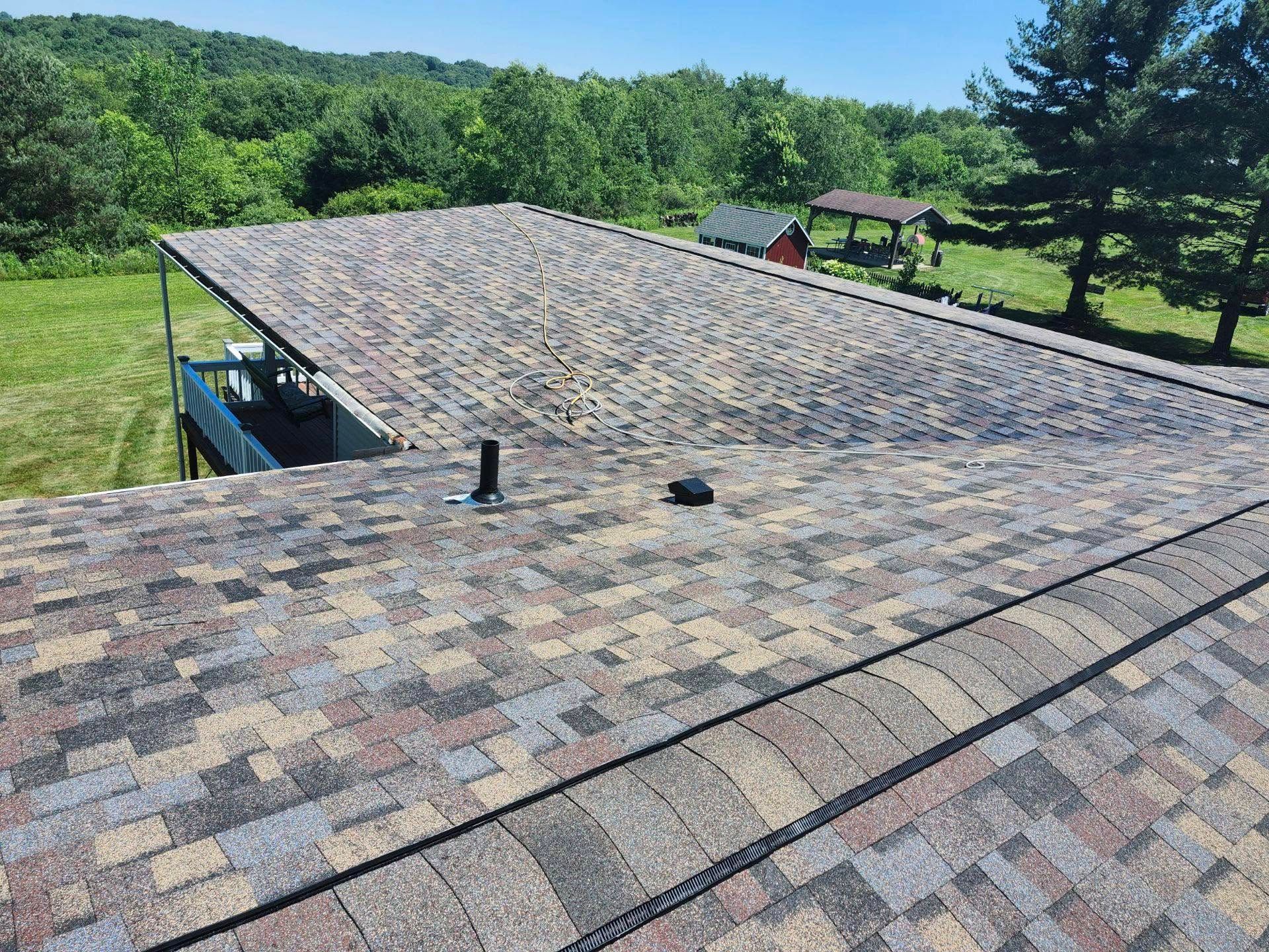 The roof of a house with a lot of shingles on it.