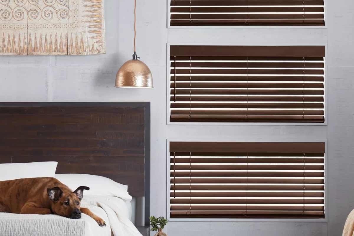 Hunter Douglas Parkland® Wood Blinds in a streamlined, modern bedroom near Manasquan, NJ