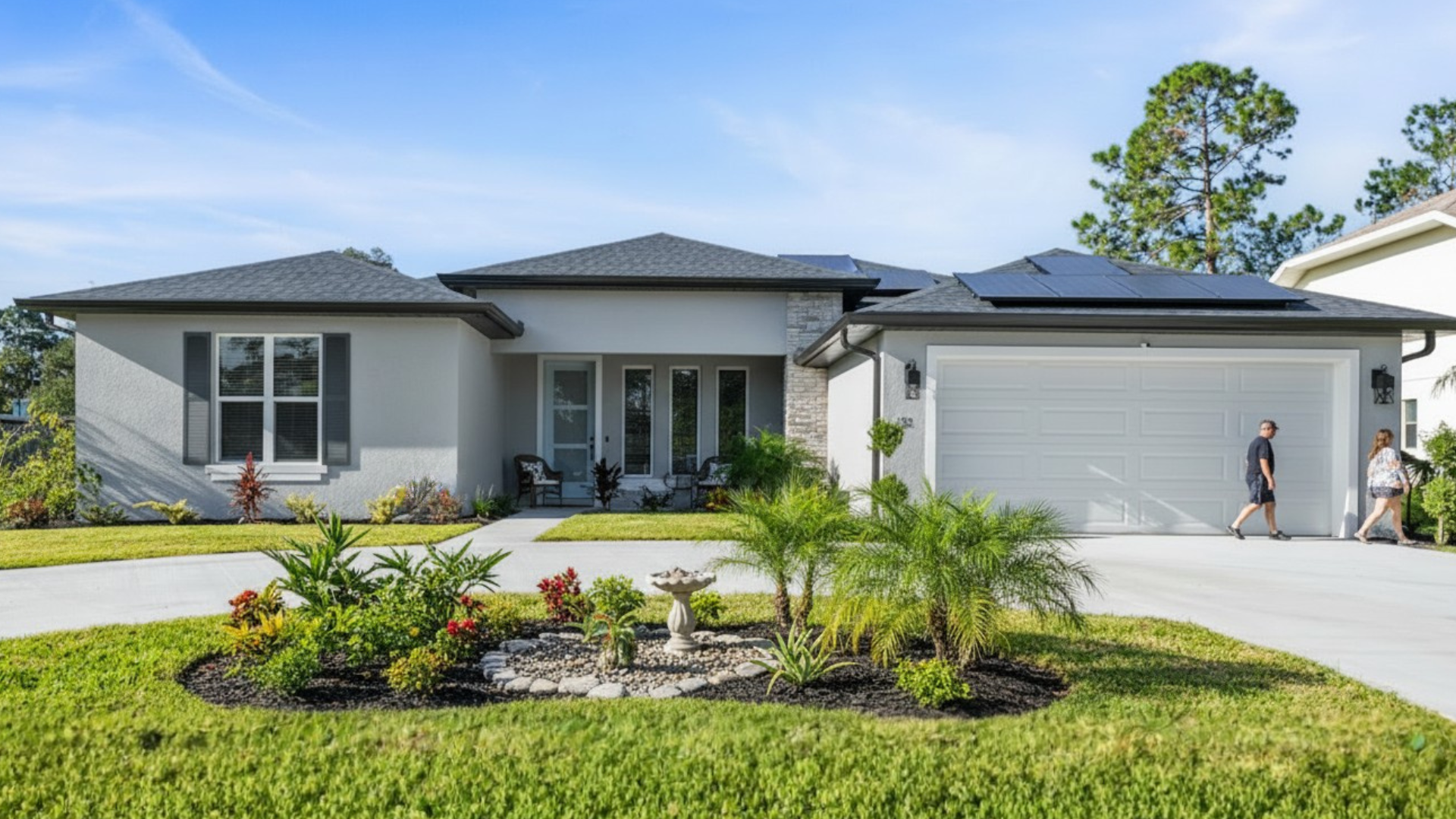 Modern Caspian Homes Grand Alborz home with solar panels, large energy-efficient windows, lush land