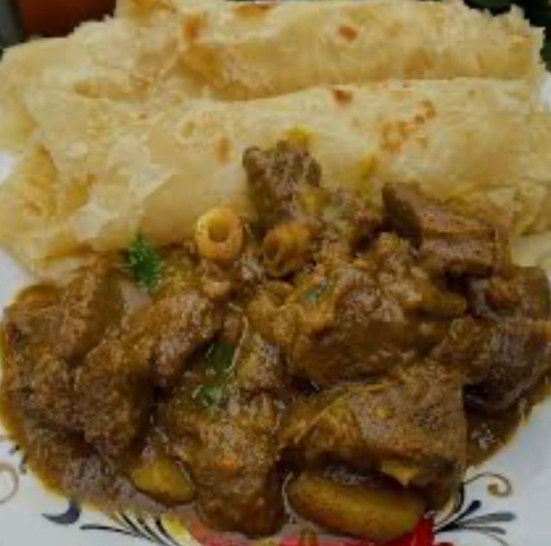 Curry goat with roti