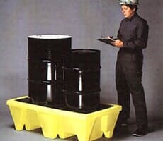 Man with Spill Pallets and two steel drum — Steel Drums in Capitol Heights, MD