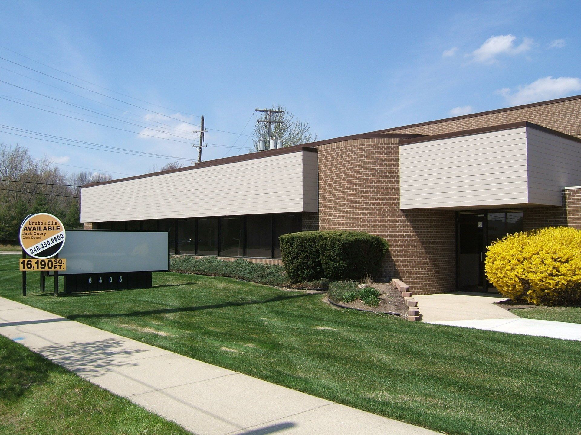 Outside shot of a property with Grubb Ellis Property sign