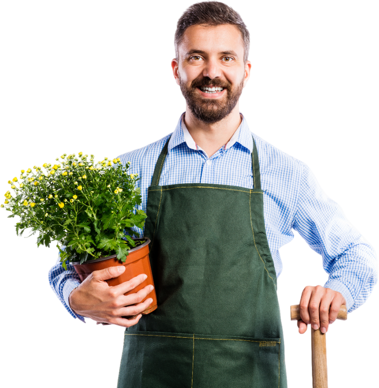 a man in an apron is holding a potted plant