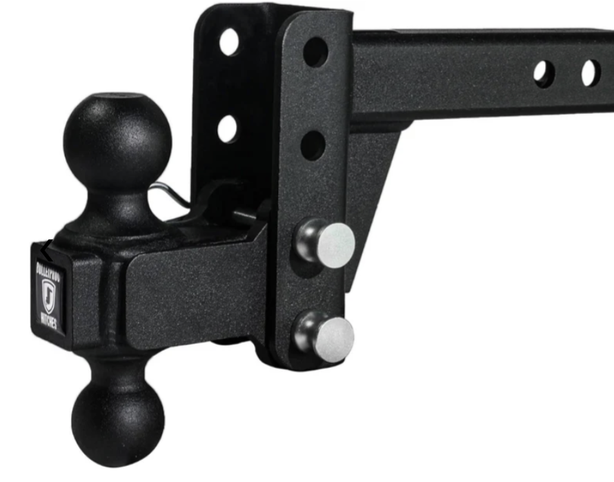 Black trailer hitch with tow ball mount and metal bracket on a white background