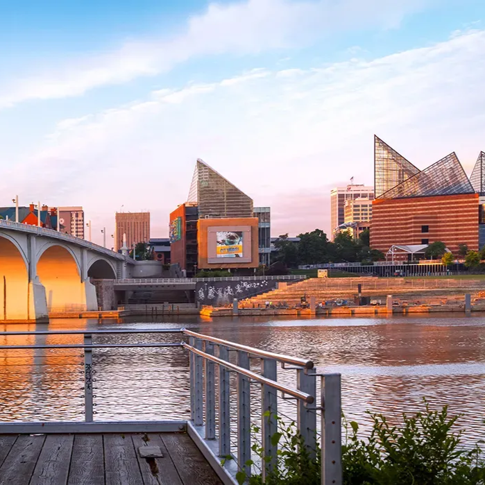 A cartoon of a man standing next to a car and a billboard that says injured ?