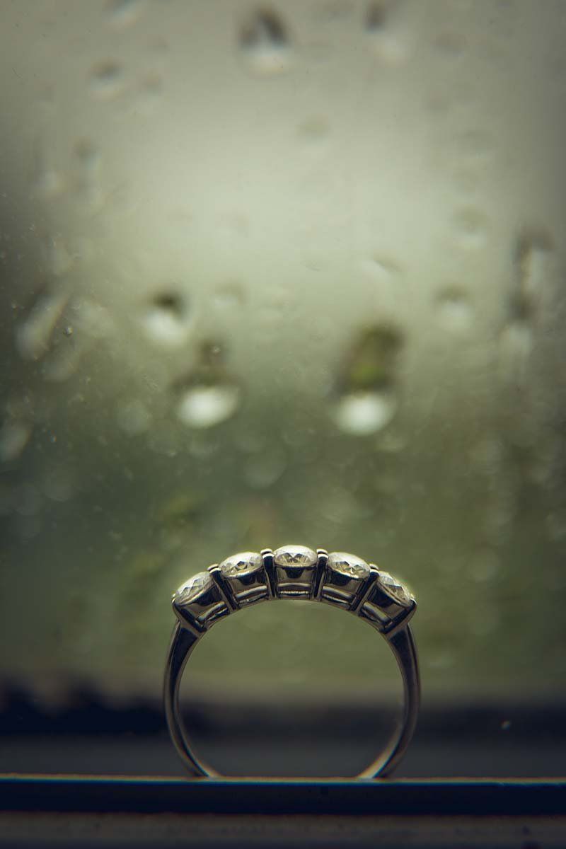 Ballinacurra House wedding ring photo in front of rain dropped window