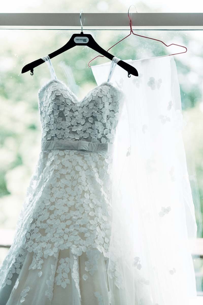 wedding dress hanging at window Fota Island Resort