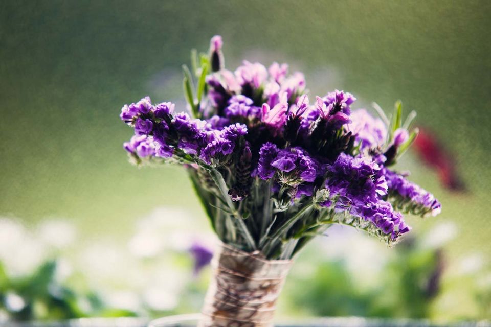 Wedding flowers in front of frosted glass