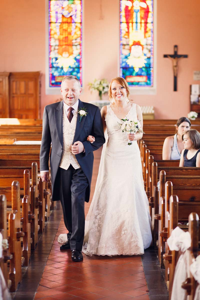 bride walking down the aisle with father at gaggin church bandon