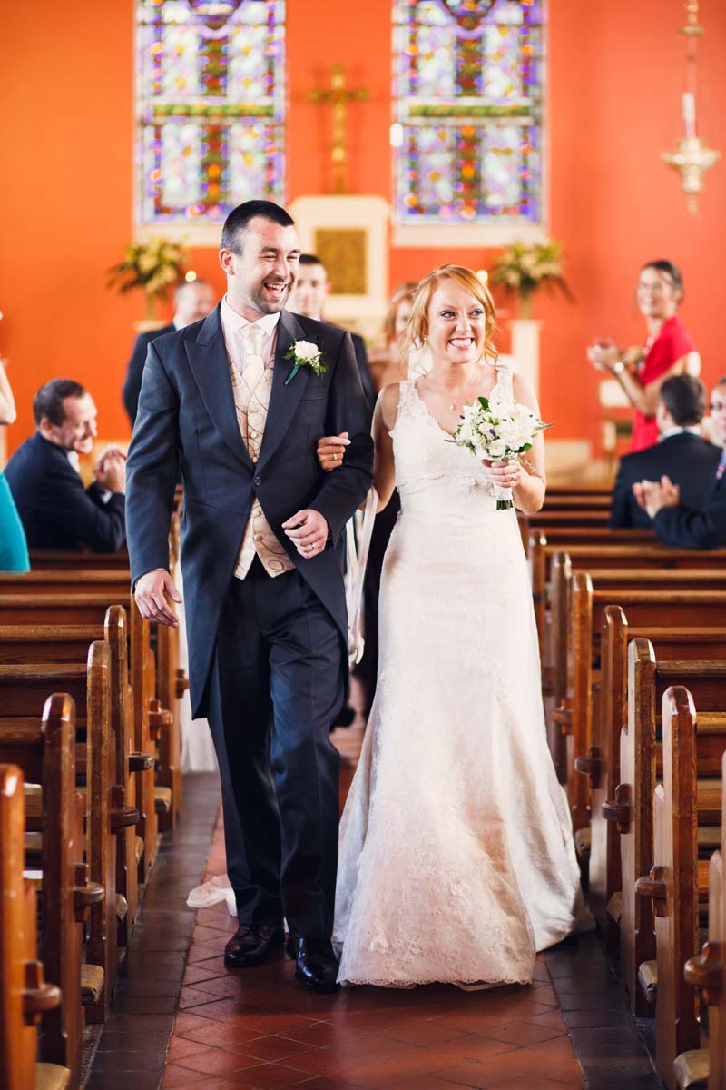 wedding couple leaving ceremony at gaggin church bandon