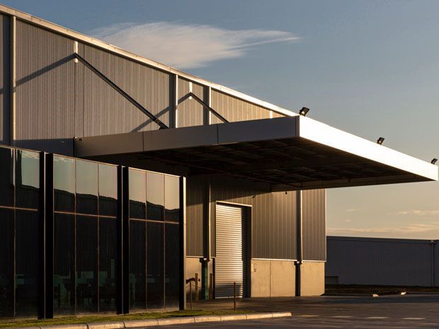 A large building with a canopy over the entrance