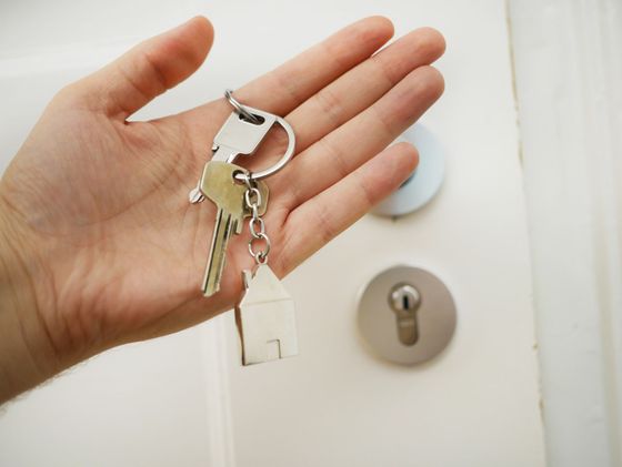 homeowner holding new house keys