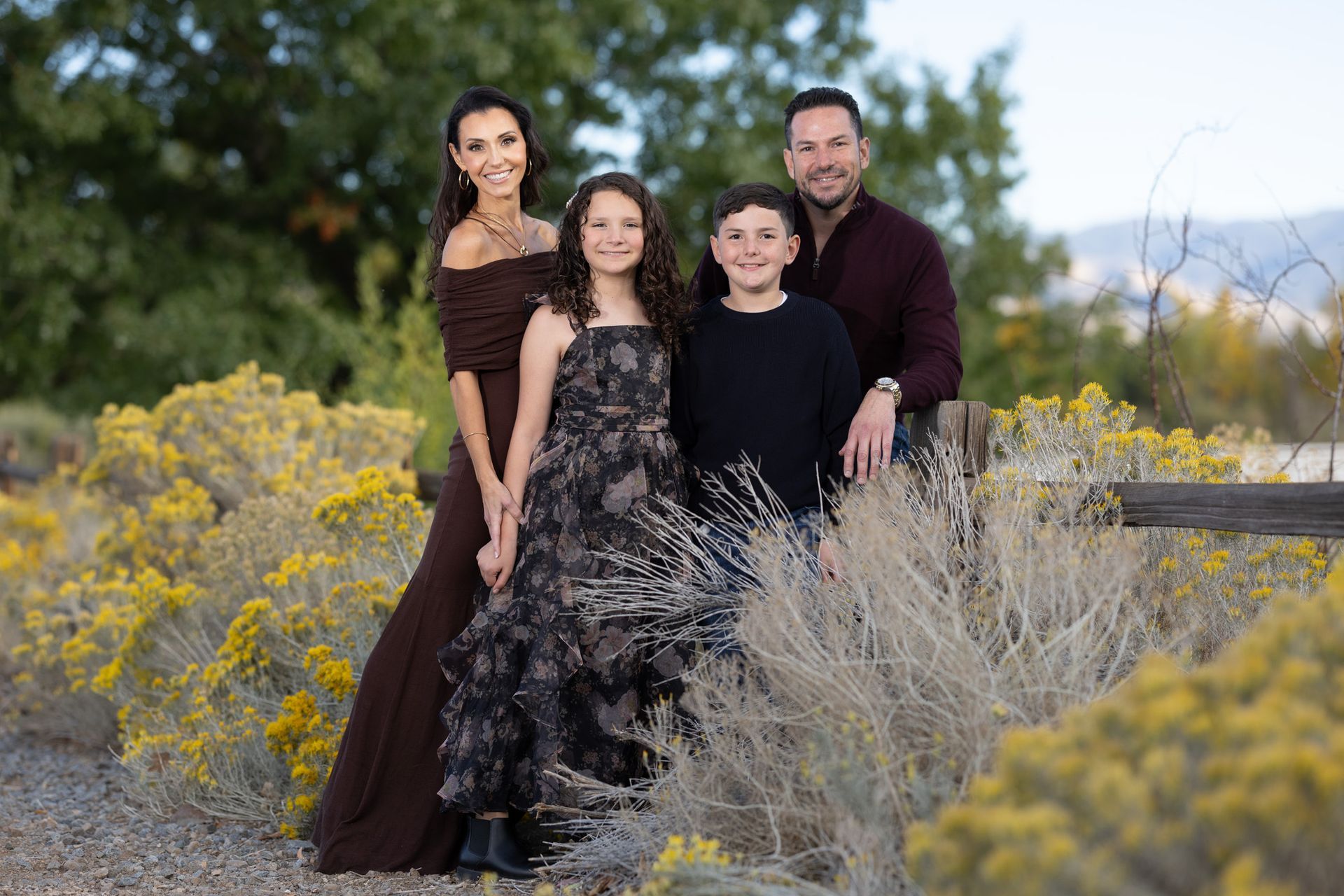 Close-up taken by Tahoe family photographer of giggling kids during an impromptu autumn photo moment.