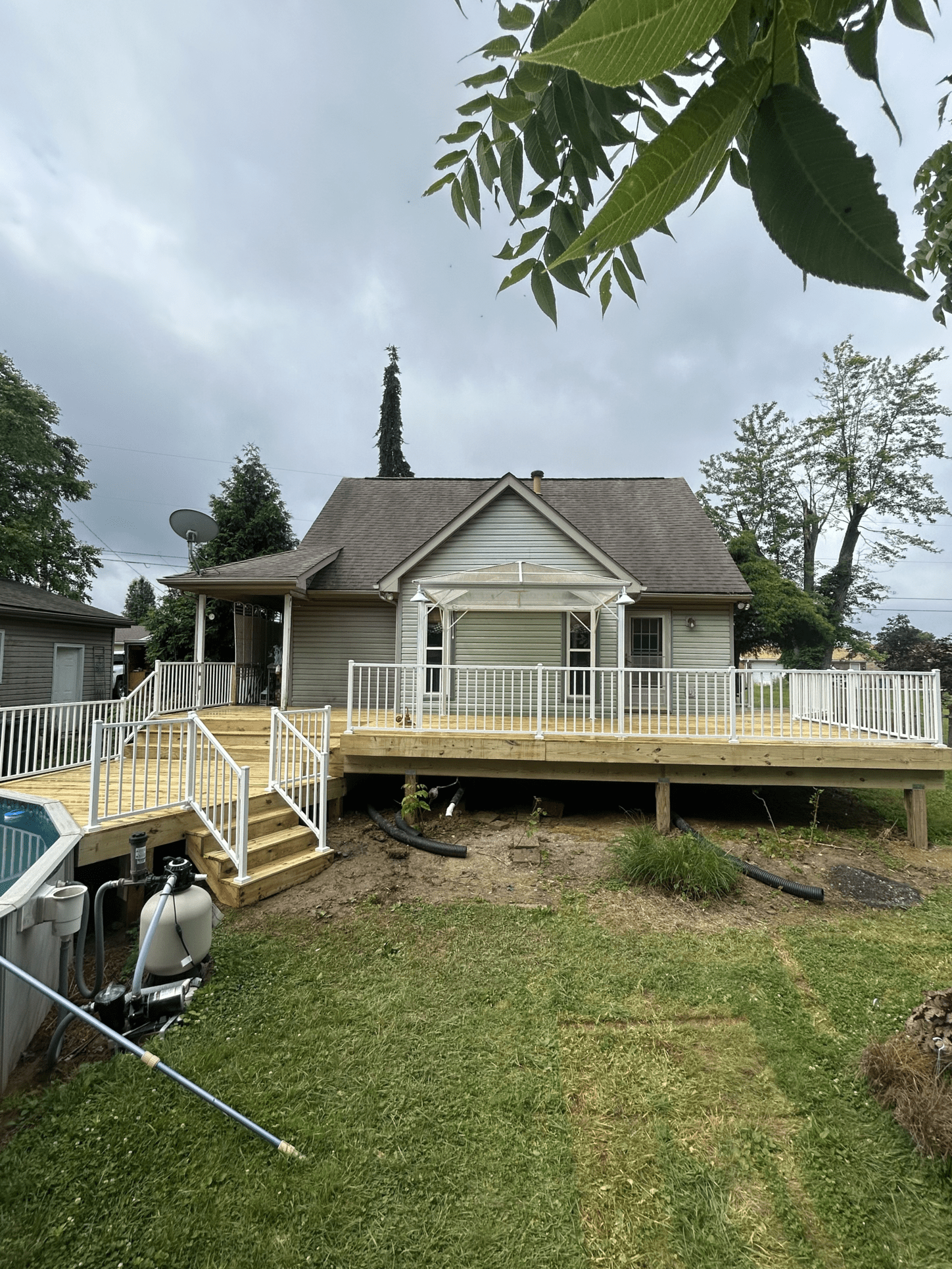 Multi-level wooden decks with custom seating areas.
