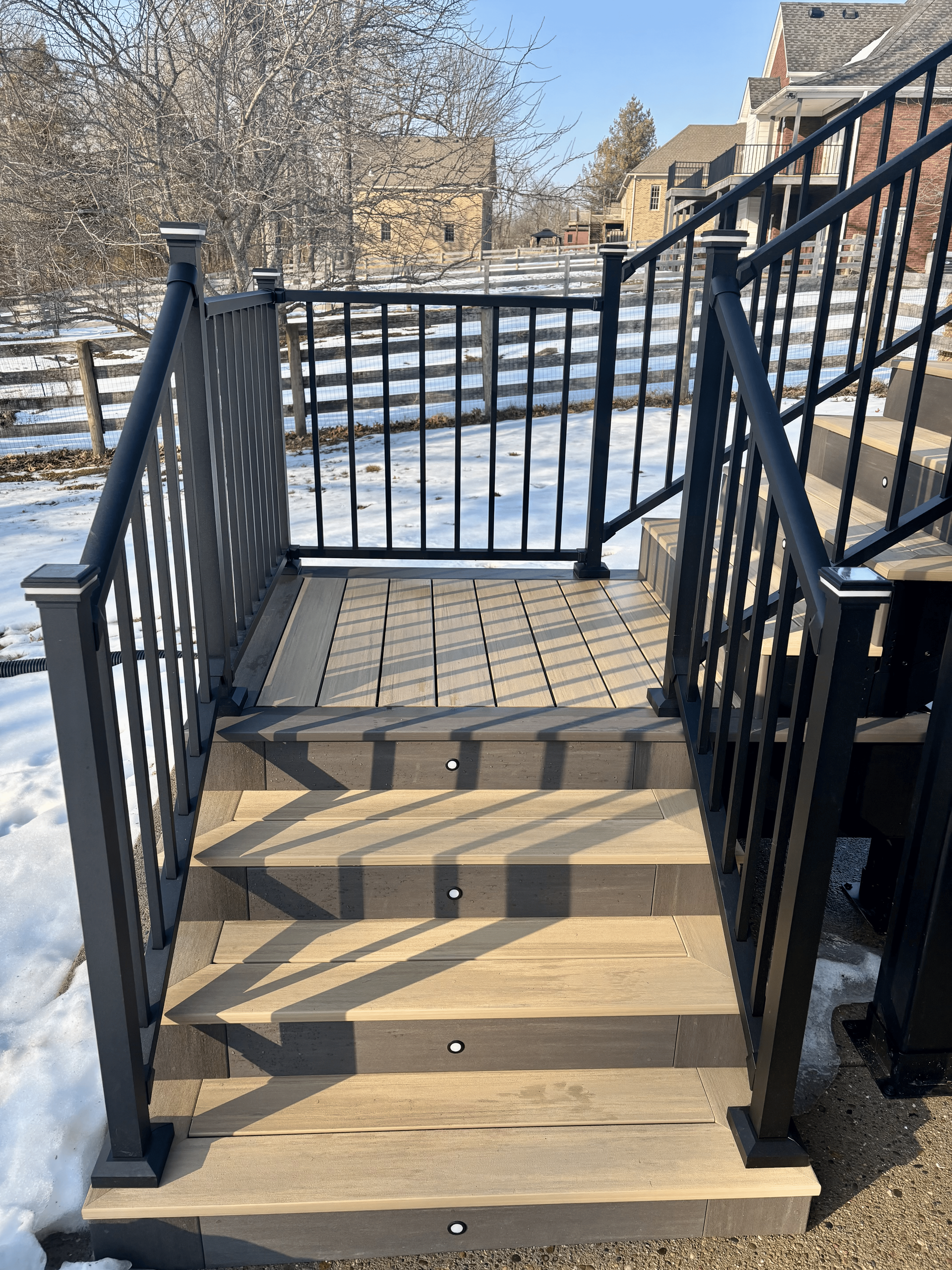 Modern composite decks with built-in lighting.