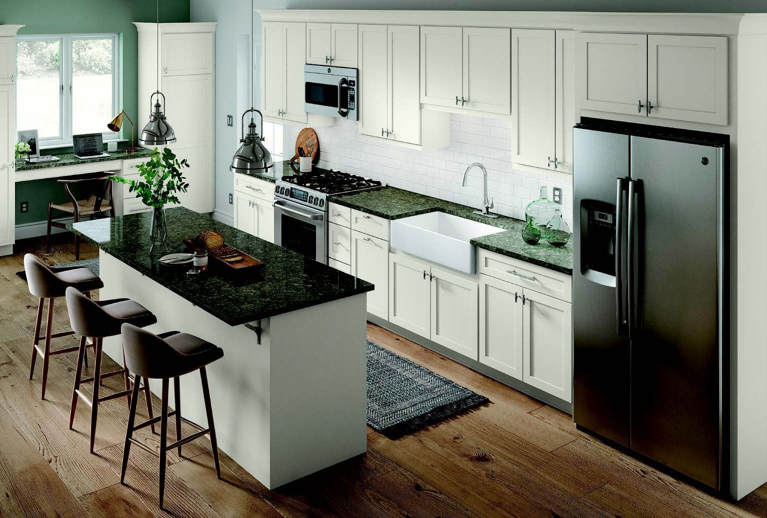 A kitchen with white cabinets , stainless steel appliances , granite counter tops and a large island.