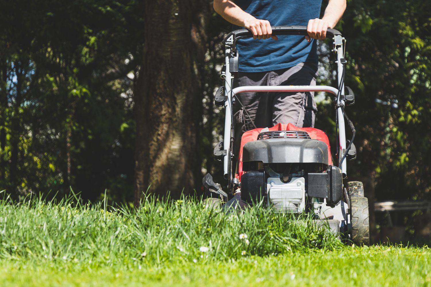 Man Using A Lawn Mower — Chelsea, ME — AK Lawn & Landscape LLC