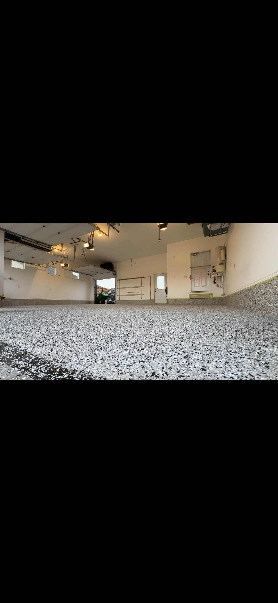 A car is parked in a parking garage.