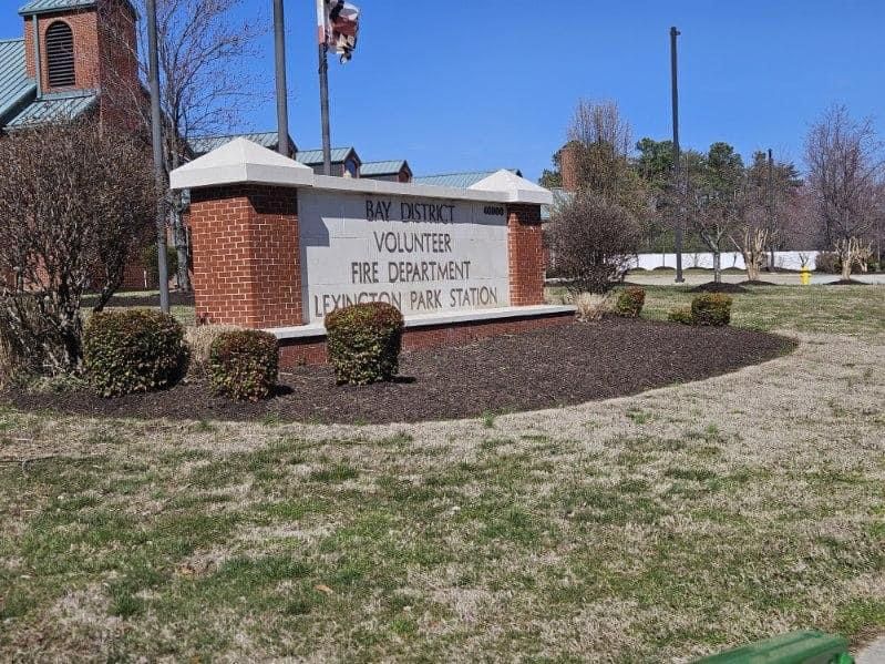 A sign that says volunteer fire department on it