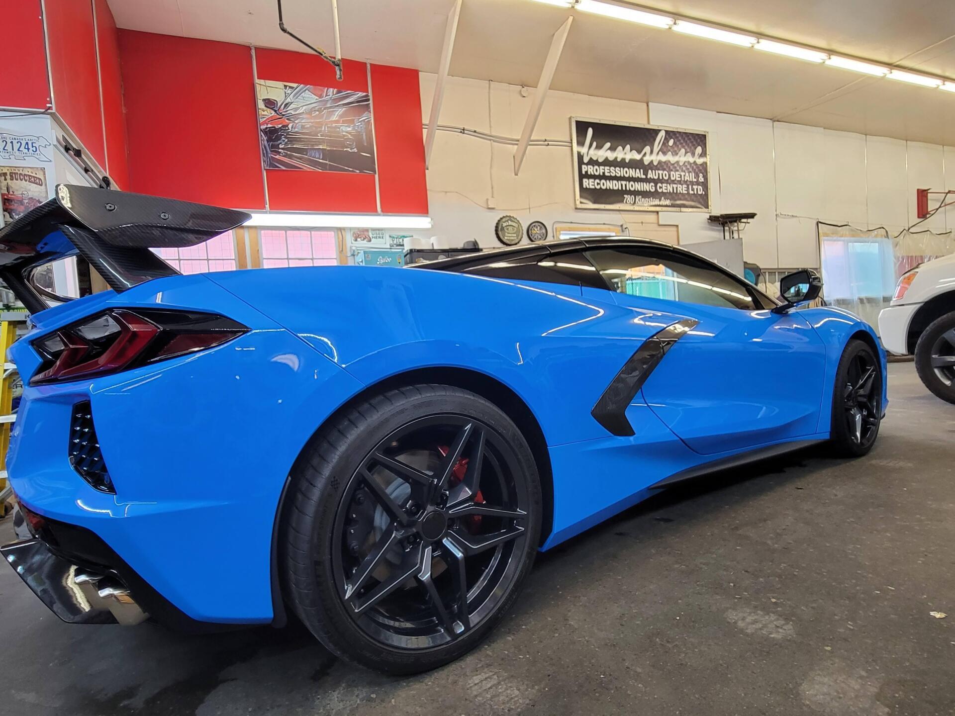 Blue Car Inside Auto Shop — Kamloops, BC — Kamshine Automotive Detailing Ltd.