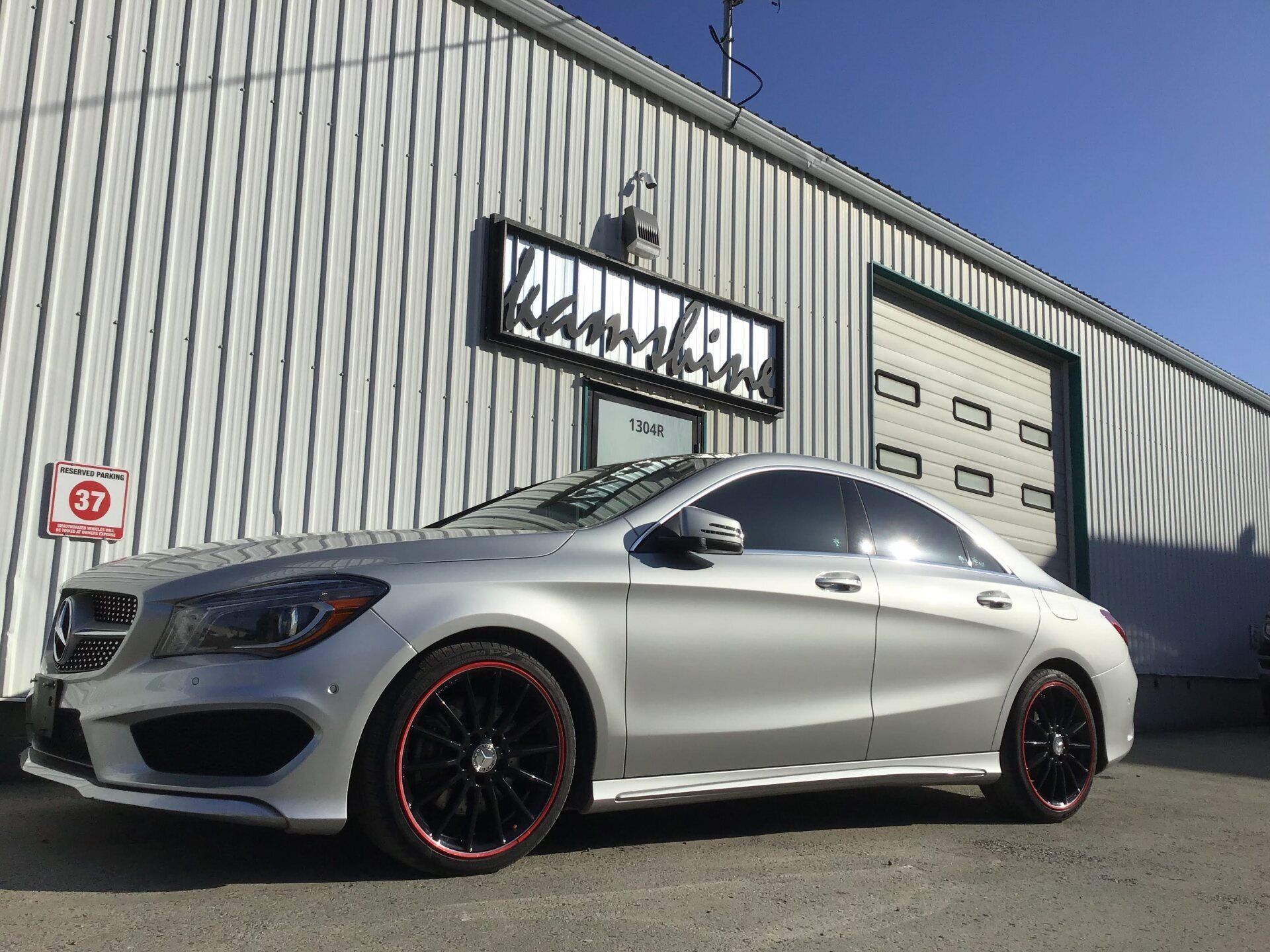 Gray Car with Red Lining Mugs and Tire — Kamloops, BC — Kamshine Automotive Detailing Ltd.