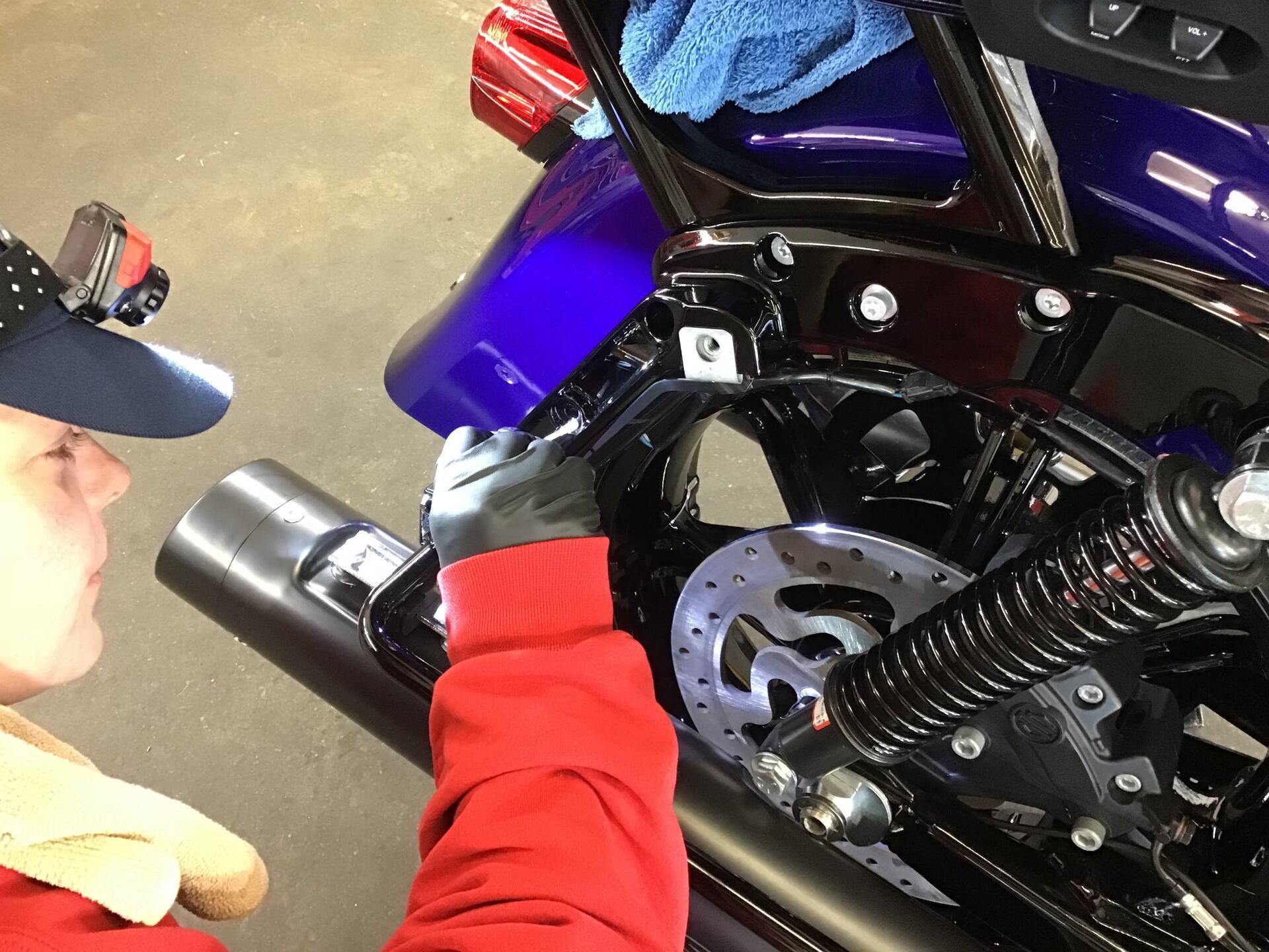 Man Put Coating in Motor — Kamloops, BC — Kamshine Automotive Detailing Ltd.