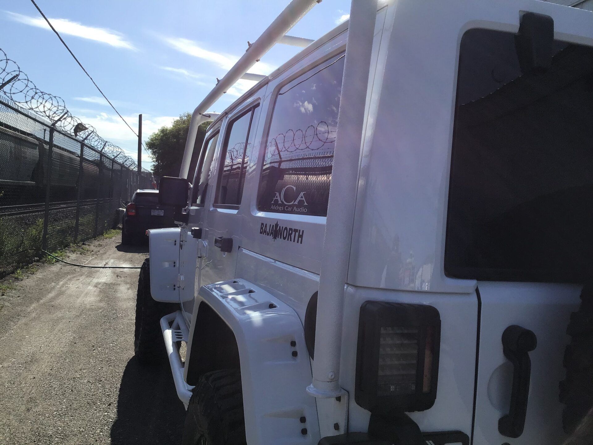 White Car with Custom Side Decals — Kamloops, BC — Kamshine Automotive Detailing Ltd.