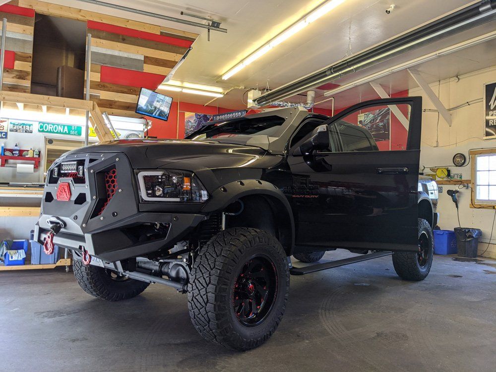 Black Big Car Before Detailing — Kamloops, BC — Kamshine Automotive Detailing Ltd.